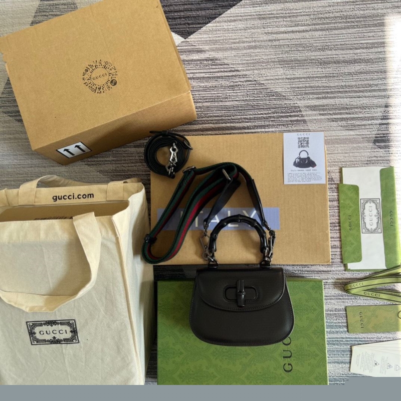 G*u*i top handle bags